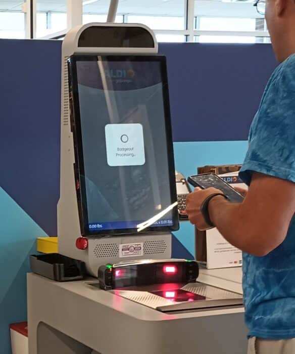 The processing screen on the Aldigo kiosk.
